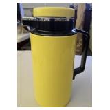 Yellow plastic thermos pitcher