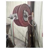 Retractable welding hose