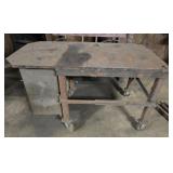 Vintage metal table on wheels