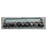 vintage metal socket tray holding a set