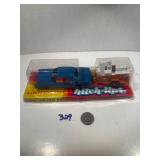 Car Pulling a U-Haul Trailer, Tootsie Toy