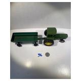 John Deere tractor and green painted wagon