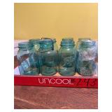 8 assorted green jars