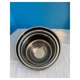 Set of 4 stainless steel nesting bowls.