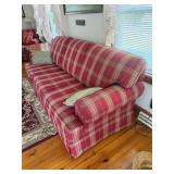 Red Sofa 95" long, 2 green Pillows