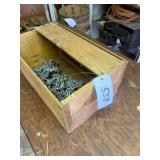 Chain pieces in wood box
