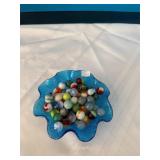 Blue bowl of marbles
