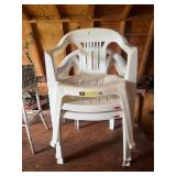 Three plastic patio chairs 2 are Rubbermaid