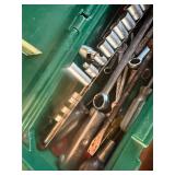 Green toolbox with tools