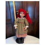 Red-head Ceramic Doll on stand