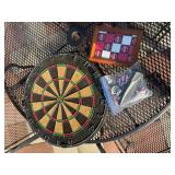 Dart board and cabinet