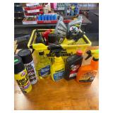 Partial bottles of cleaner & oil