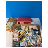 2 boxes, 1 orange box of cards