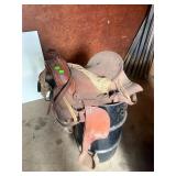 Western Saddle & Metal Barrel