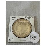 1884-O Morgan Silver Dollar. AU.