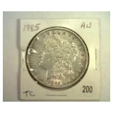 1885 MORGAN SILVER DOLLAR AU
