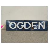Porcelain sign that says Ogden, 6x24 in,