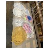 Large collection of round crocheted doilies