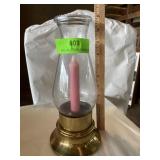 Vintage brass hurricane candle holder with candle