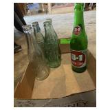 Collection of vintage soda bottles