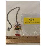 Vintage beaded Indian chief 2 inch pendant with