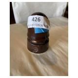 Brown, ceramic insulator