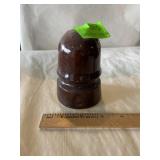Brown, ceramic insulator