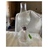 Vintage hurricane lamp with laurel leaf torch