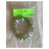 Pink and light green crystal stretch bracelet.