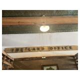 Long wood sign about 14 feet long by 12 inches