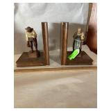 Vintage carved figurines book ends..  each about