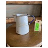 Vintage enamel white pitcher 5 1/2 inches tall