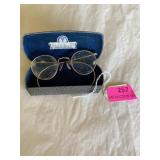 Vintage glasses and case. Glasses are trimmed in