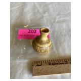 Carved calabash gourd. One and three-quarter inch
