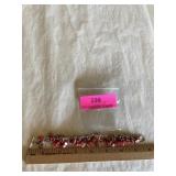Ladies bracelet, coral/mother of pearl?