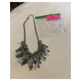 Chain-link necklace with assorted shades of blue