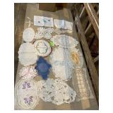 Collection of smaller doilies ovals, and