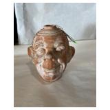 1950 to 60s Smiling Jim grass growing clay head..