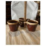 Hull handled coffee mugs.  brown drip glaze
