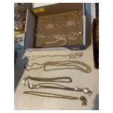Assorted pearl and gold tone chain necklaces