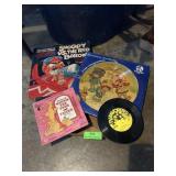 Vintage albums and 45s. Snoopy versus the red