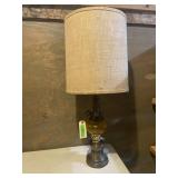 Amber glass and brass looking lamp with linen