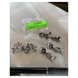 Collection of silver toned pierced earrings