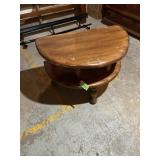 Heavy wood half moon shaped table with three legs