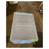 Four Rubbermaid clear totes  23 x 16 1/2 x 6