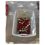 18 gallon tub with red and gold Christmas balls