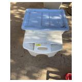Two plastic totes with lids 13 x 33 x 21 and 6 x