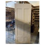 Vintage wooden door with original hardware and