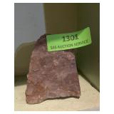 Rock. About 4 1/2 x 4.