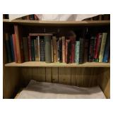 Shelf of assorted books